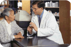 Photo of woman talking to pharmacist.