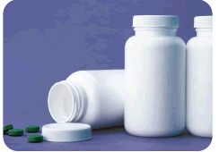 Photo of pill containers and pills.